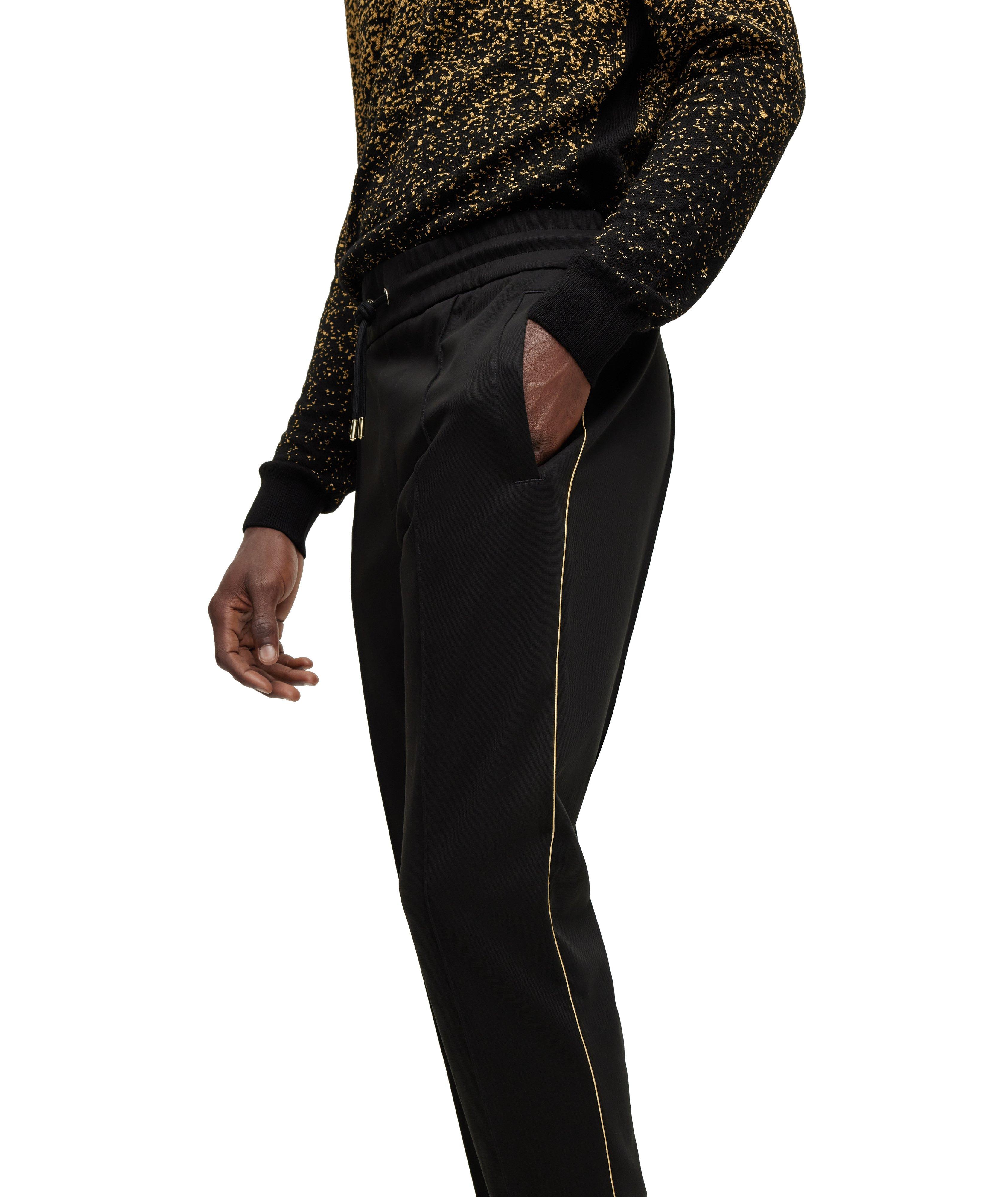 Black dress pants with gold stripe on sale