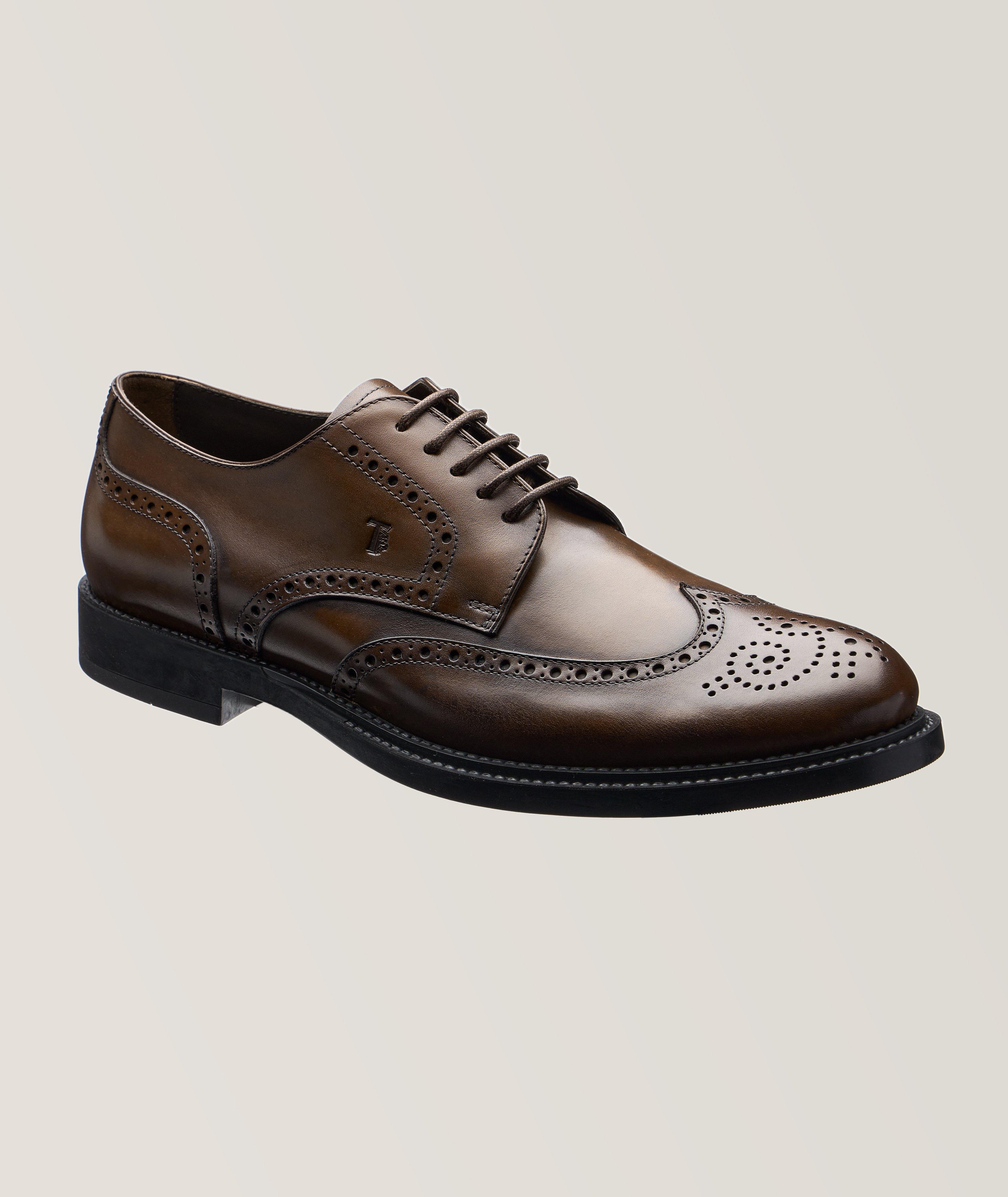 Tod's Burnished Wingtip Leather Derbies