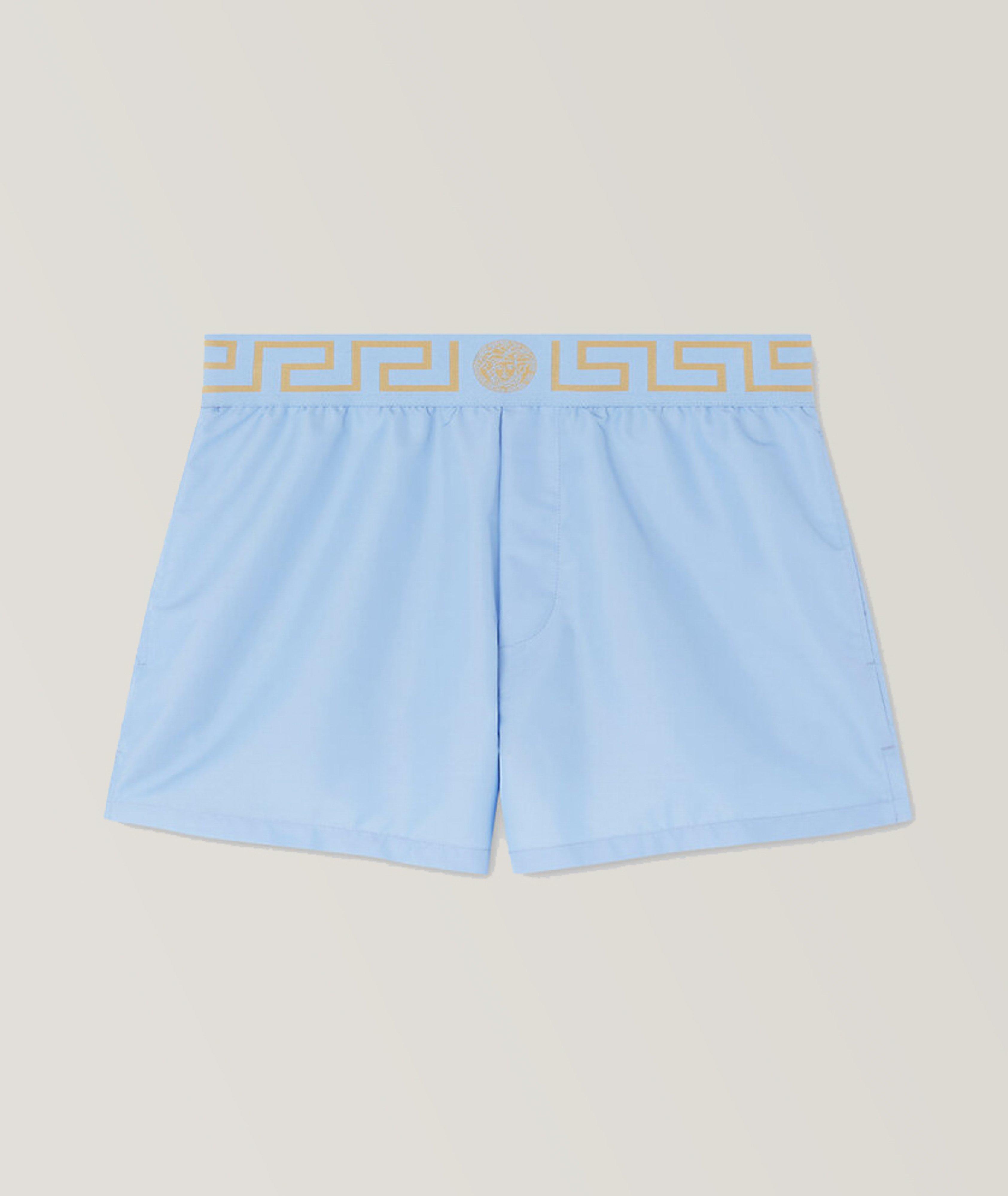 Greca border swim shorts in blue - Versace