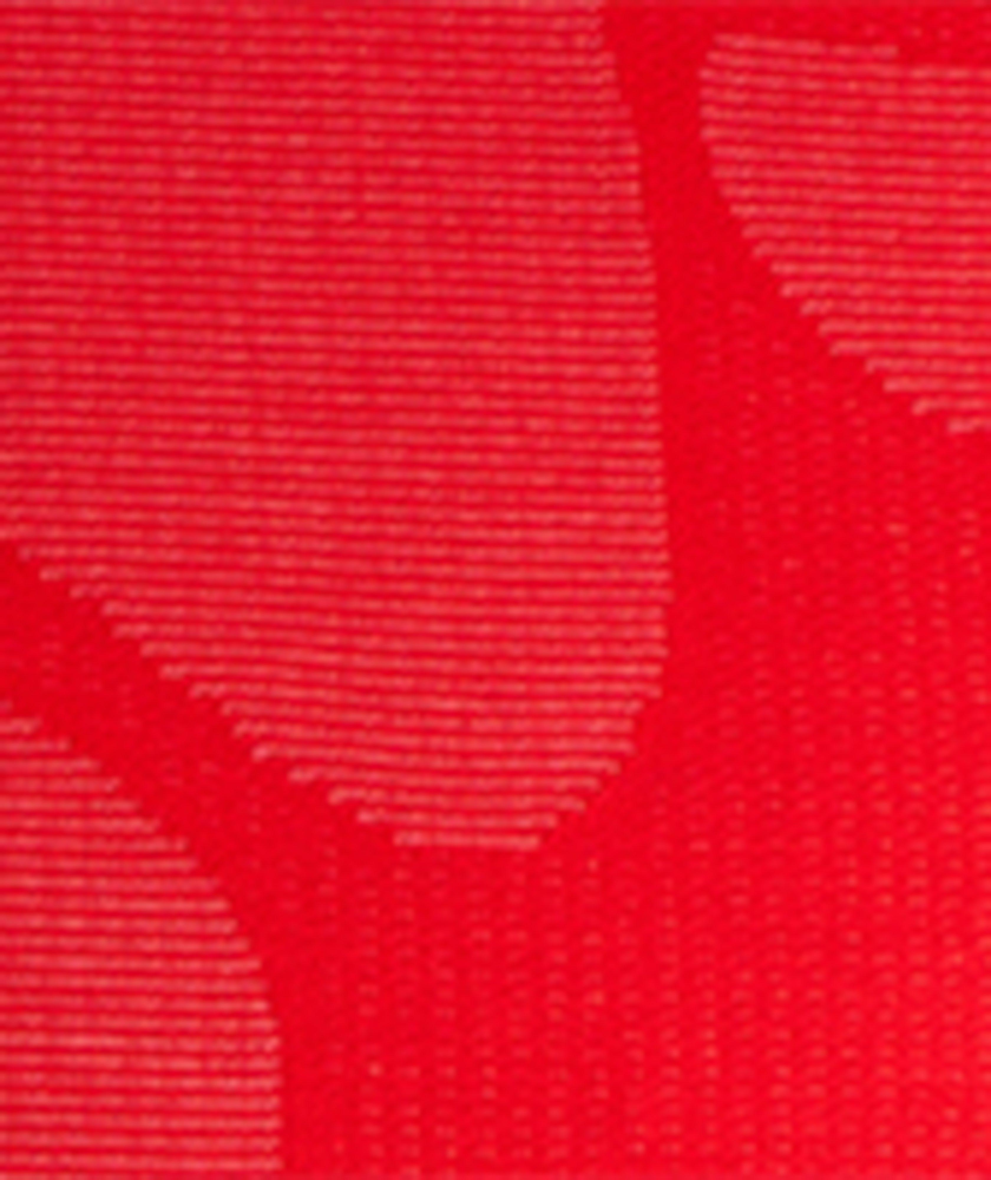 Polo en coton à motif de feuilles tropicales image 5