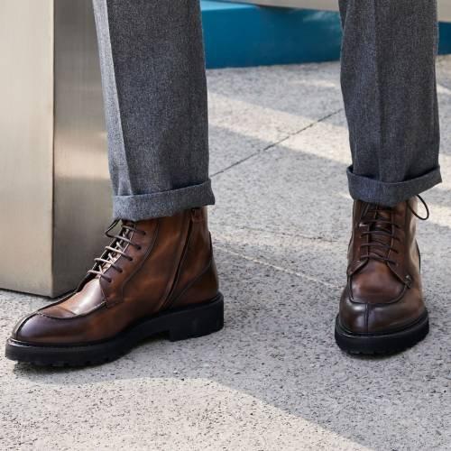 Male Model in Black Boot on Stairs