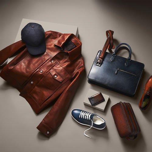 Collections Berluti : Blouson, Sneakers, Porte-cartes, Trousse de toilette, Mallette, Ceinture, Richelieu, Casquette