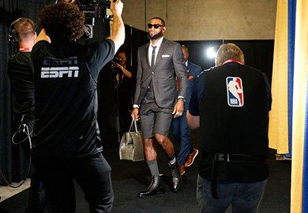 LeBron James walking into the Oracle Area wearing shorts