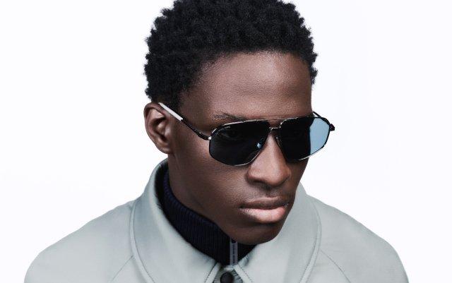 Male model wearing Canada Goose sunglasses