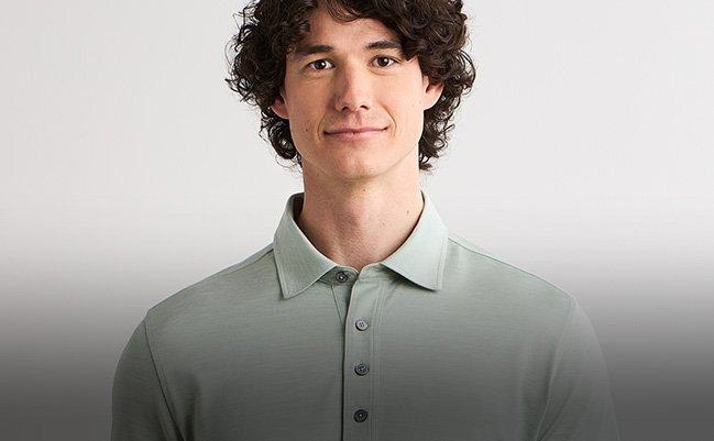 Male model wearing ZEGNA green polo
