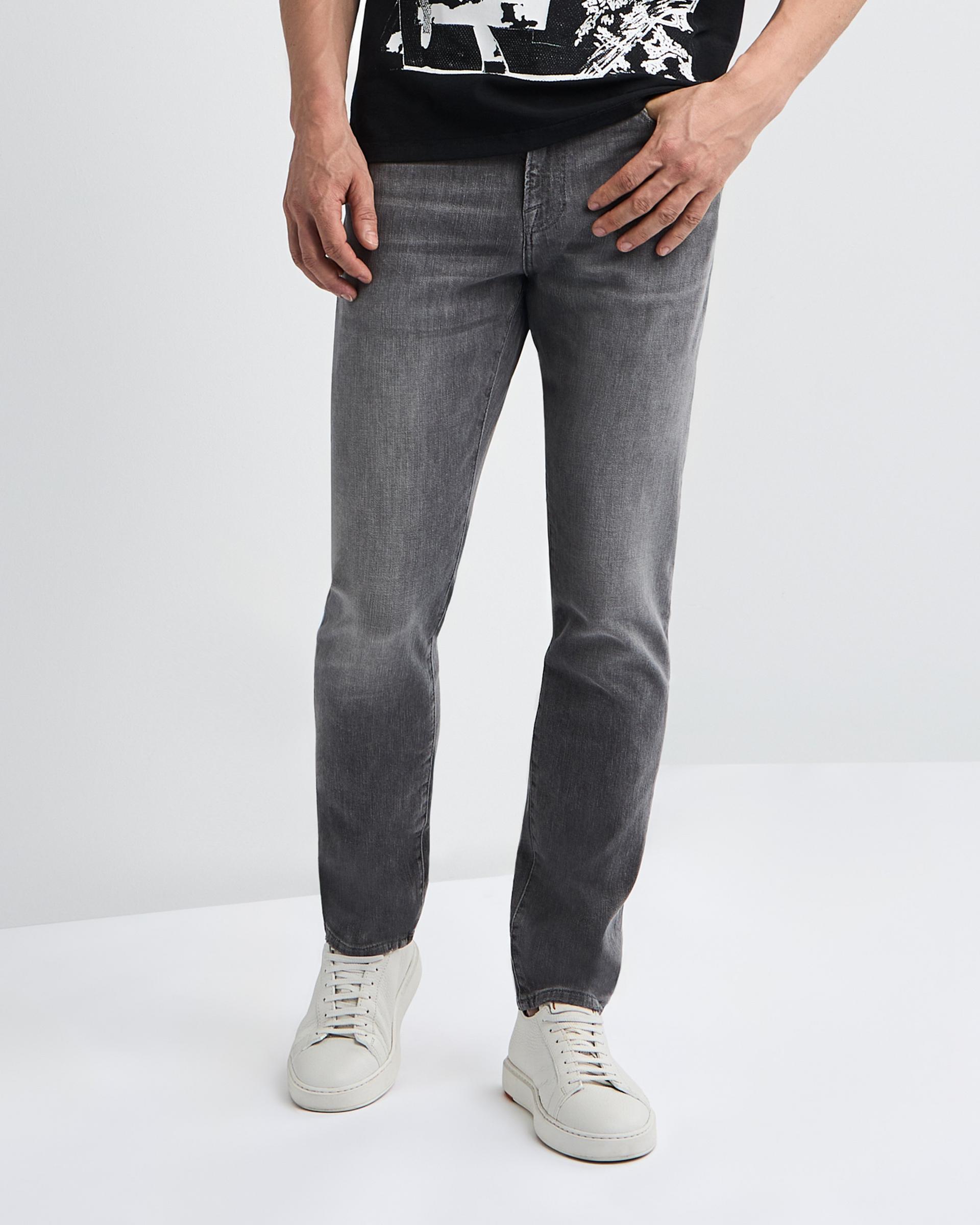 Male model wearing grey jeans