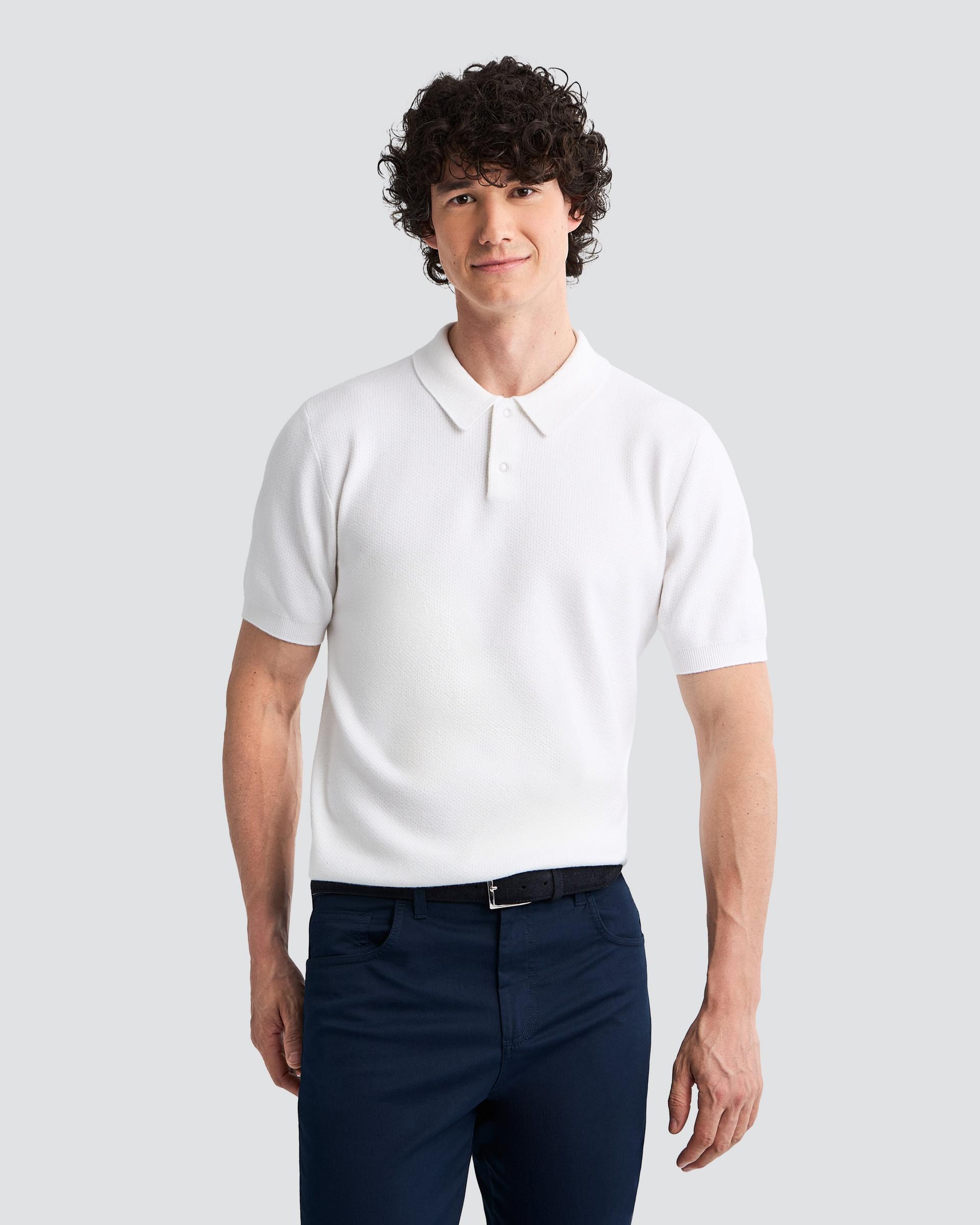 Male model in a white polo at FinalCut by Harry Rosen