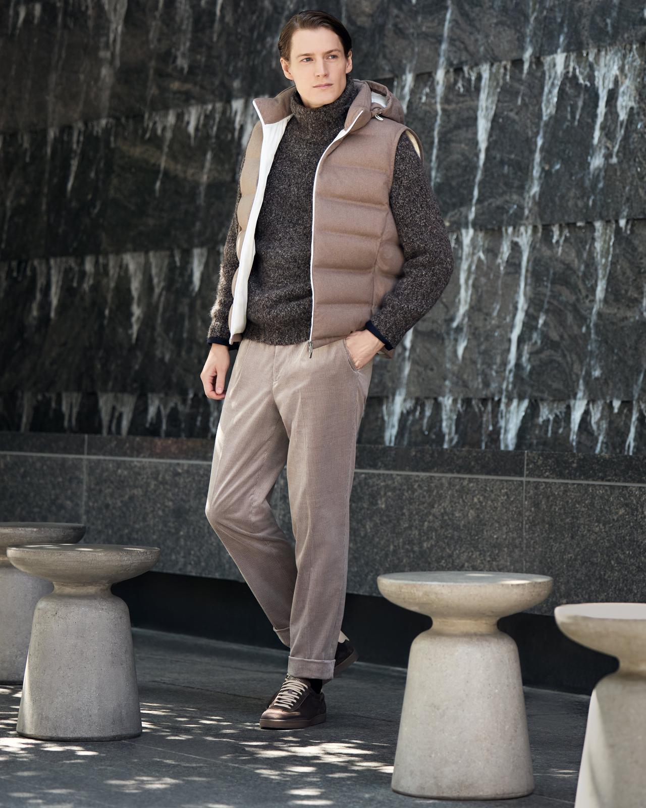 Male model wearing a brown vest