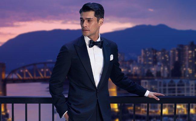 Male model wearing tuxedo showcasing staff picks nye outfits