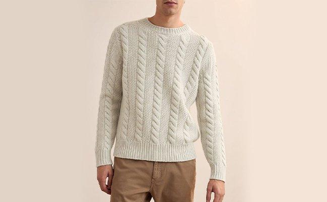 Male wearing patterned sweater