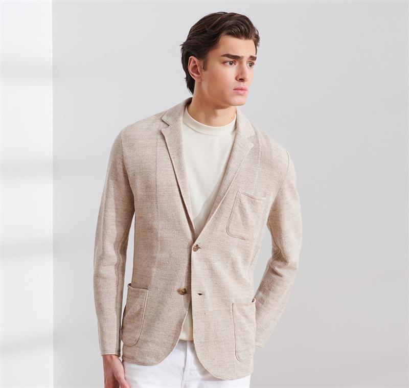 Male model wearing cardigan and lightweight sweater illustrating new arrivals