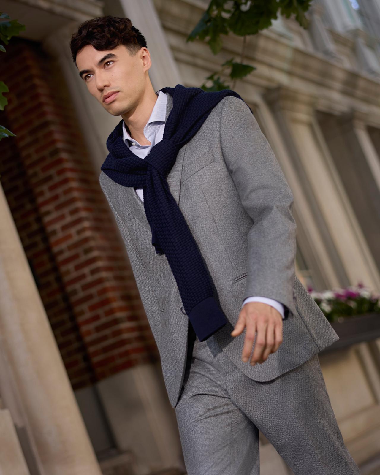 Male wearing suit signifying dressed to the nines for date night inspiration