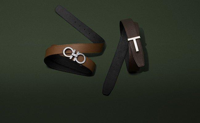Un présentoir de ceintures en cuir noir avec boucles métalliques