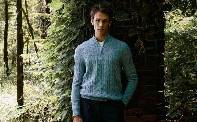 A man wearing a lightweight sweater