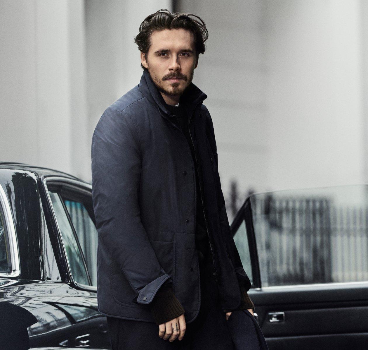 A man wearing a blue Moncler jacket