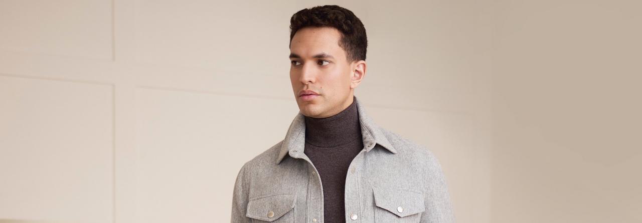 Two males wearing cashmere coats