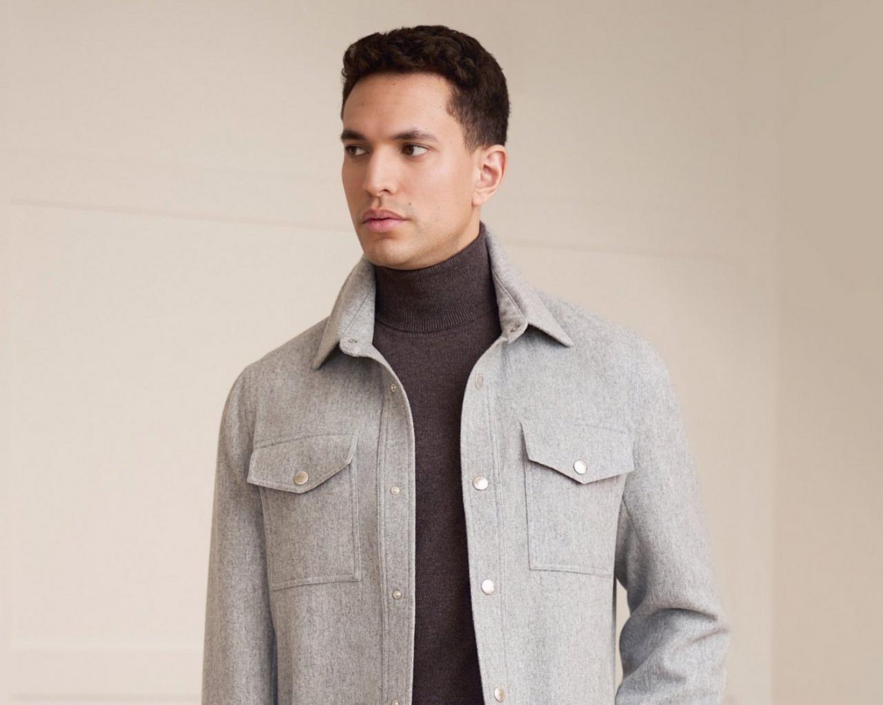 Two males wearing cashmere coats