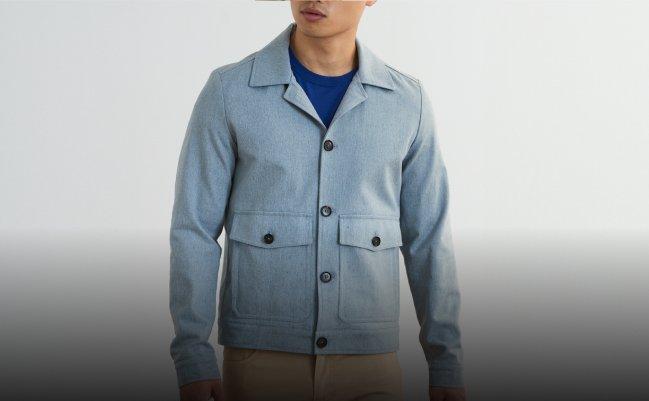 Male model wearing a blue Isaia overshirt