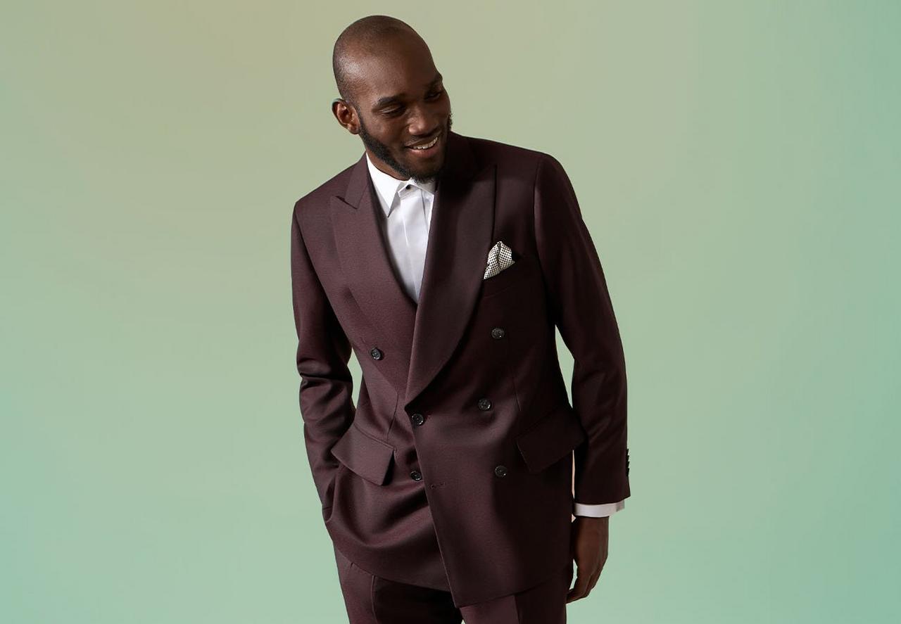 Male model wearing a burgundy suit