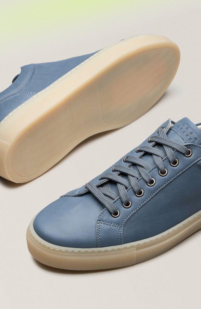 Pair of blue leather Robert Barakett sneakers with a translucent cream sole,  FW26 collection