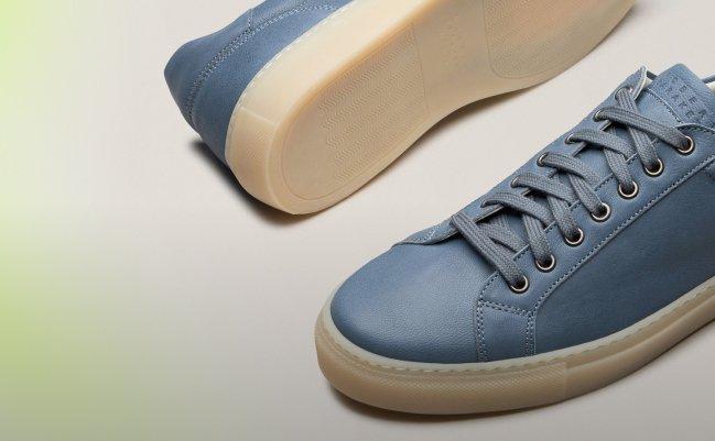Pair of blue leather Robert Barakett sneakers with a translucent cream sole, Mega Menu, FW26 collection