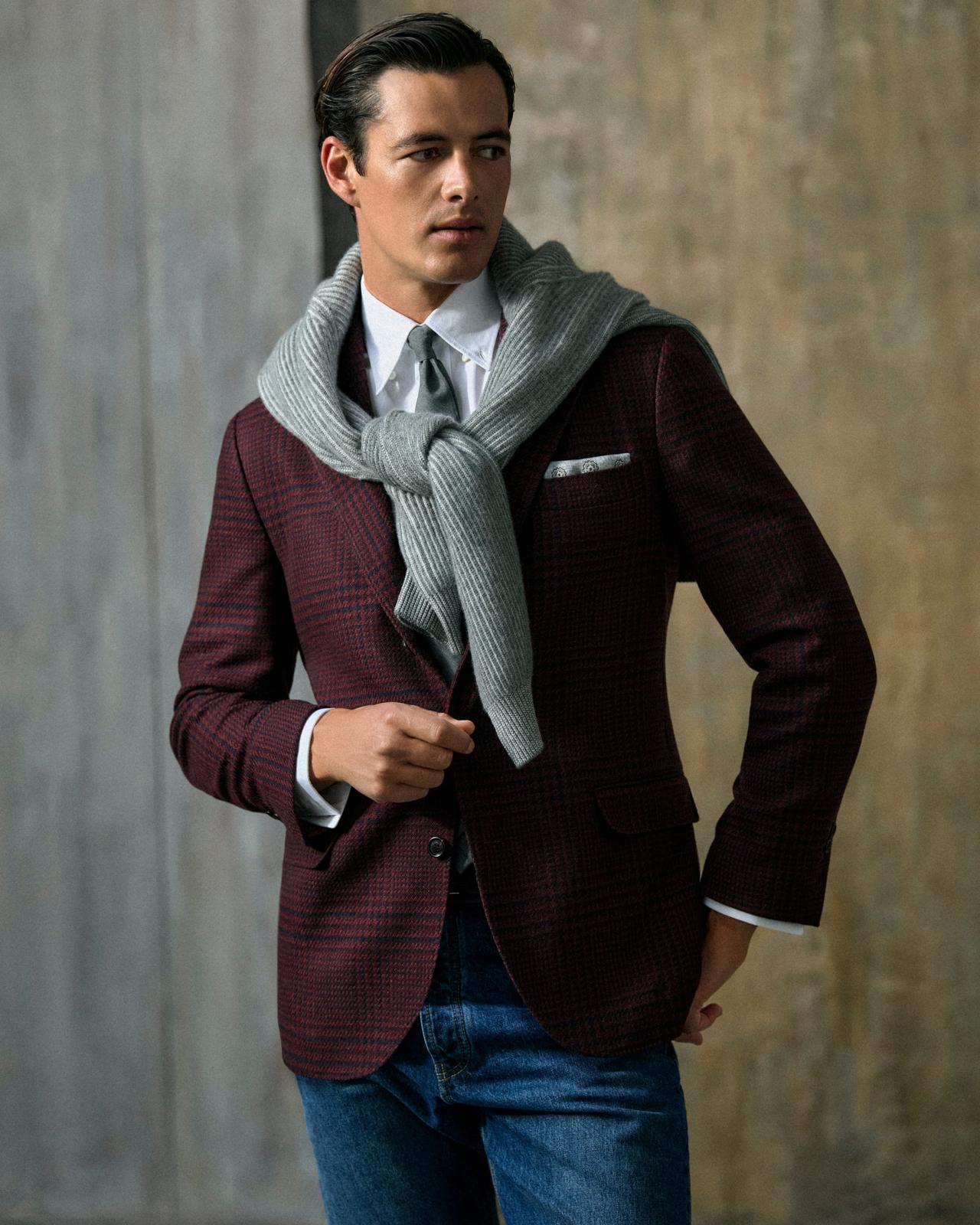 Model wearing tailored burgundy blazer