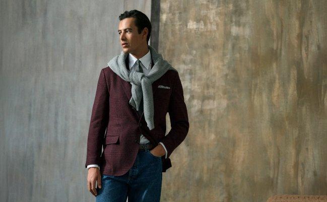 Man wearing a burgundy check blazer