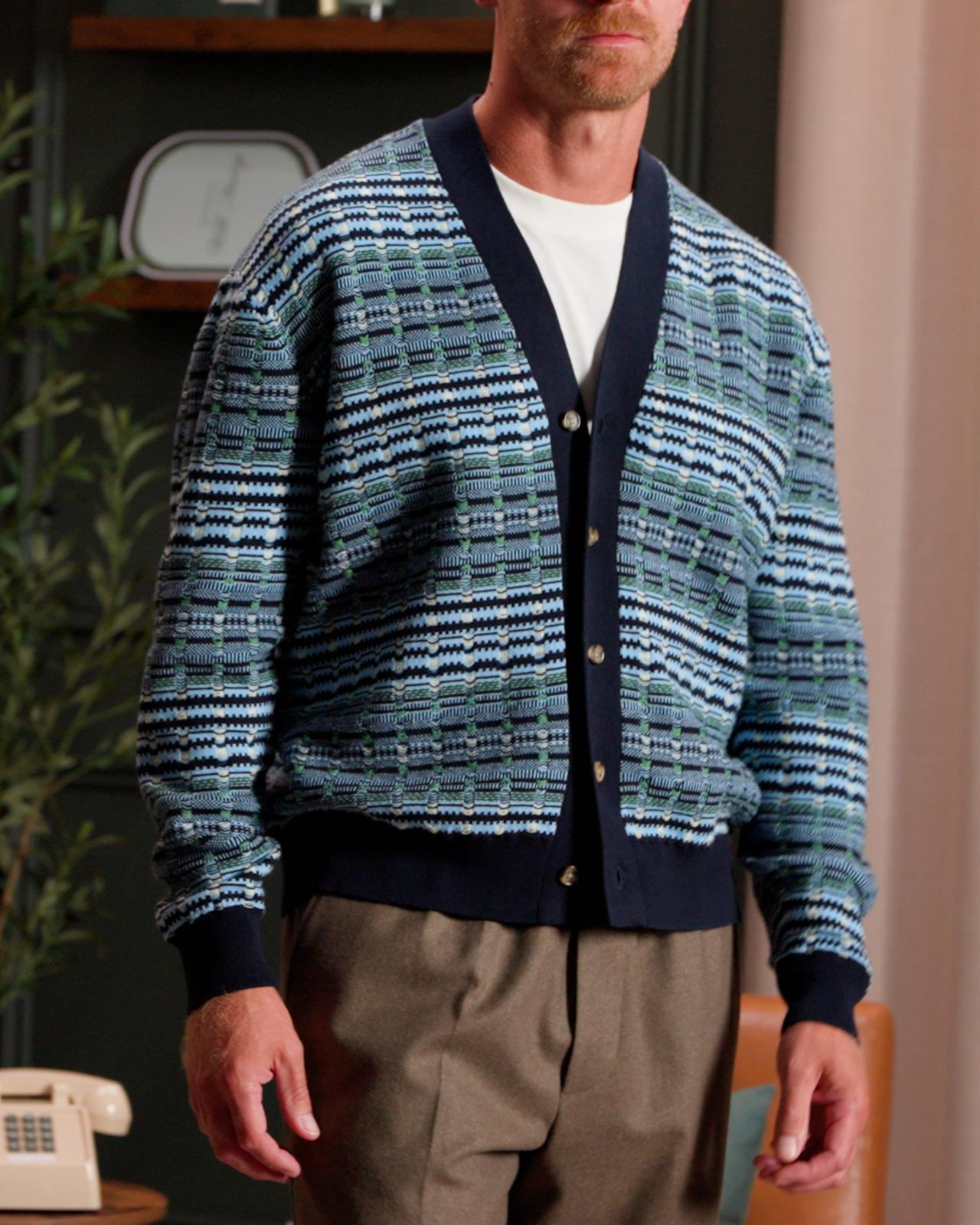 model wearing a multicolored striped V-neck cardigan