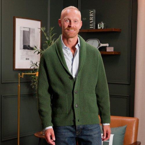 model wearing a green V-neck cardigan