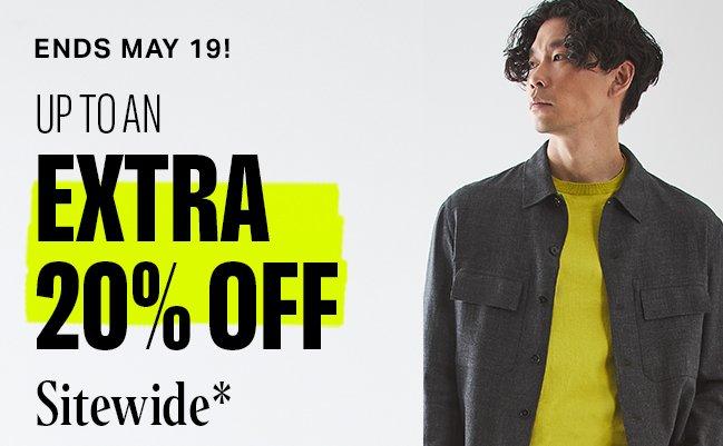 Male model wearing a ZEGNA yellow shirt promotion the up to an extra 20% off at FinalCut by Harry Rosen