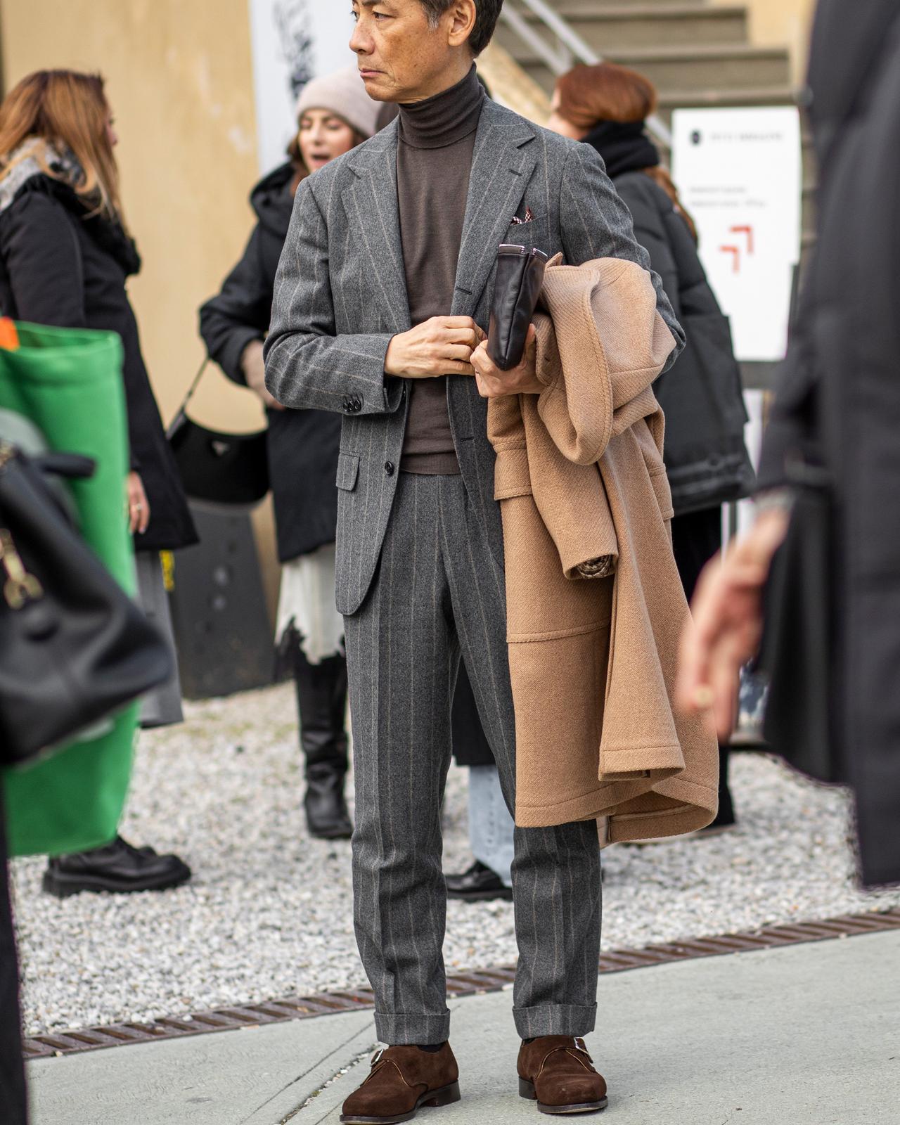 Man wearing pinstripe suit