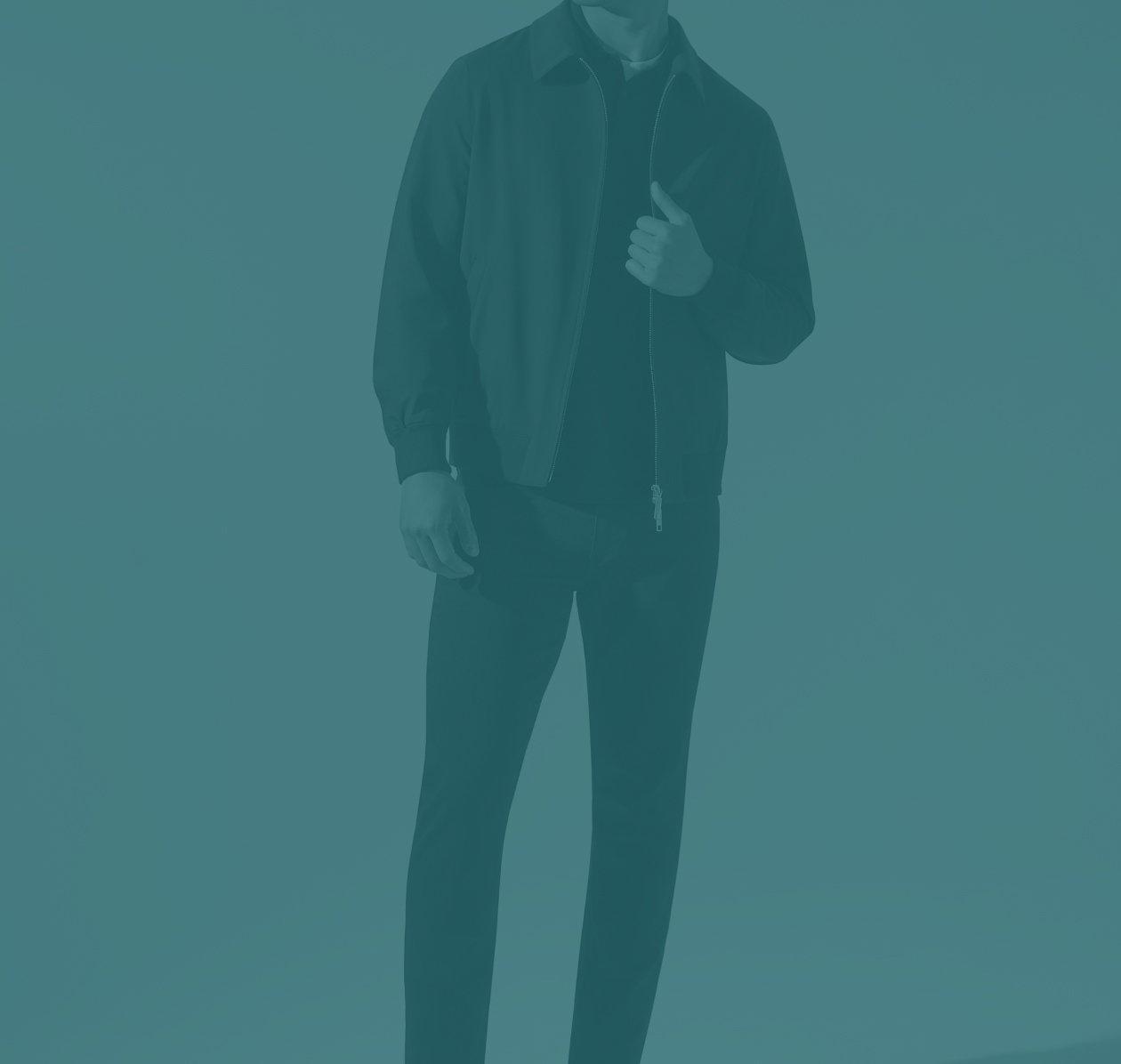 A man wearing Harold designer clothing against a blue-toned background