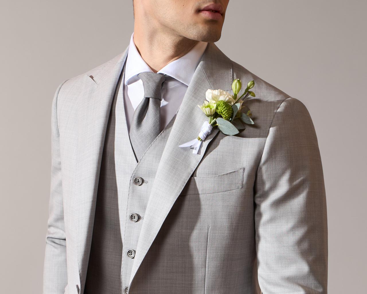 Male model wearing grey suit jacket