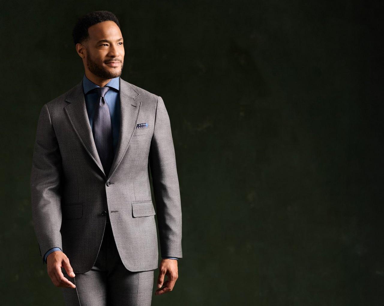 Male model wearing a grey Canali suit