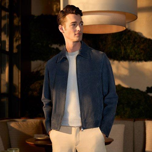 Male model wearing a blue overshirt at Harry Rosen
