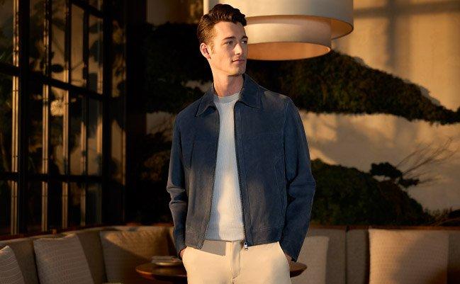 Male model wearing t-shirt and jeans signifying clothes for any occasion