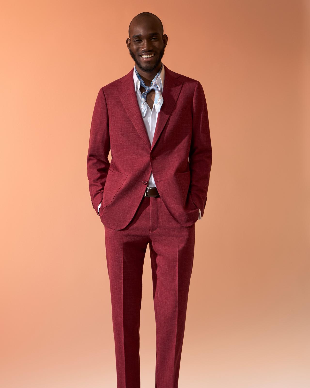 Male model wearing Harold made-to-measure red two piece suit