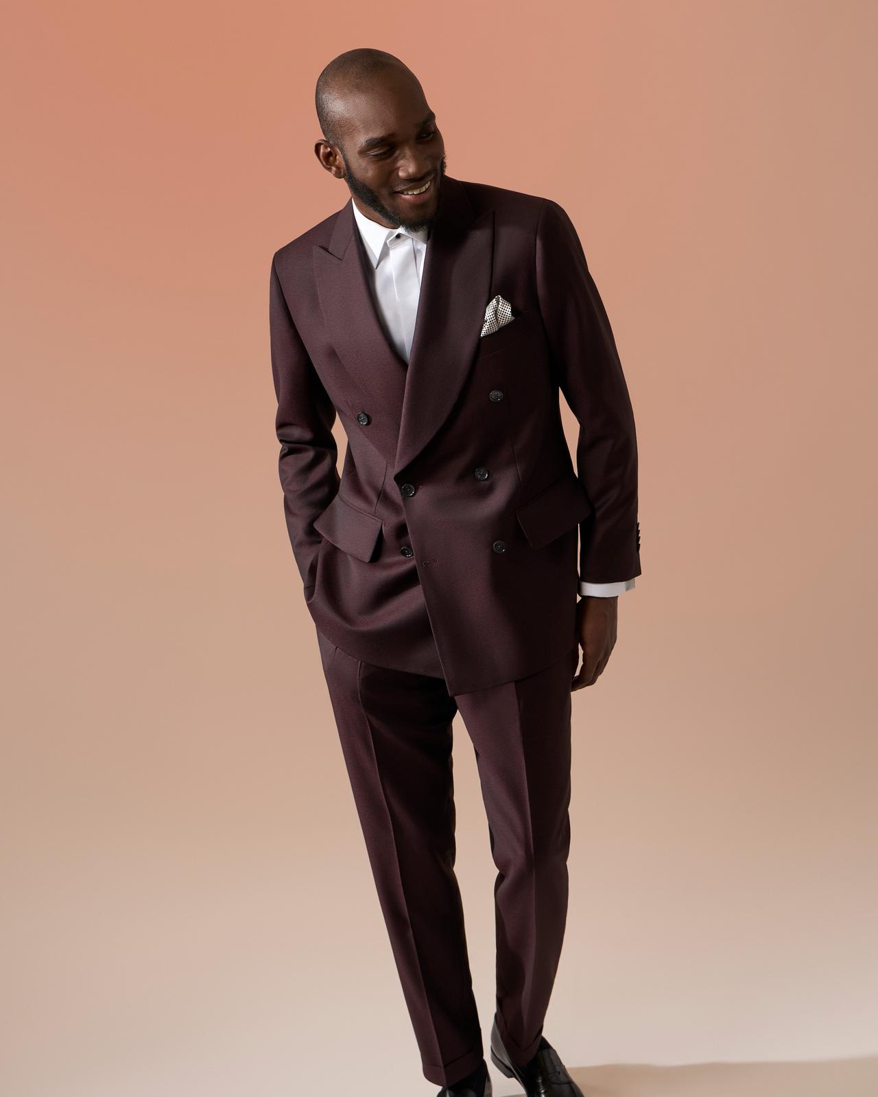 Male model wearing Harold made-to-measure double breasted burgundy suit