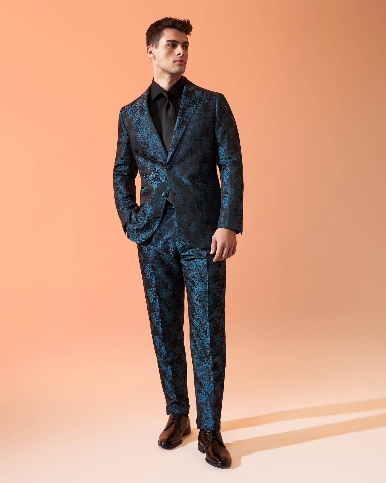 Male model wearing Harold made-to-measure navy floral suit