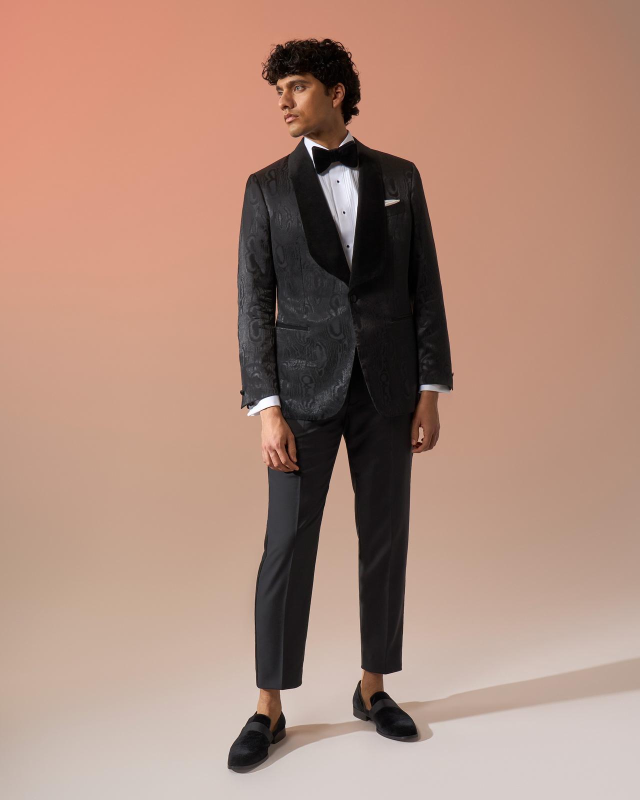 Male model wearing jacquard black tuxedo jacket