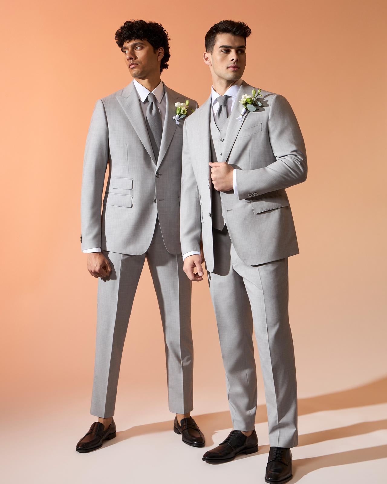 Two male models wearing Harold made-to-measure grey 3-piece suit