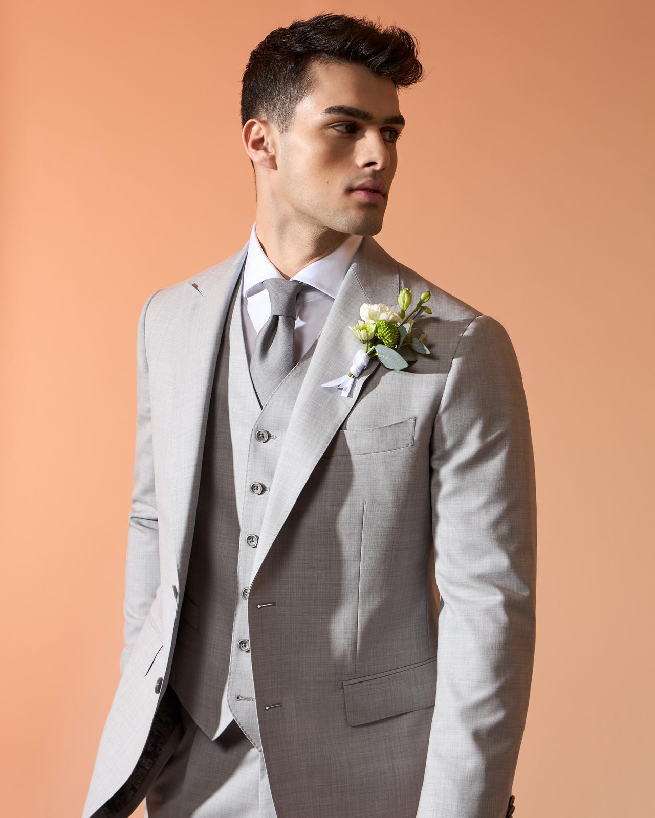 Male model wearing Harold made-to-measure grey 3-piece suit