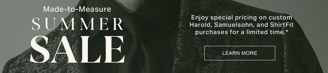 Male model in a black in white photo wearing a Harold blazer