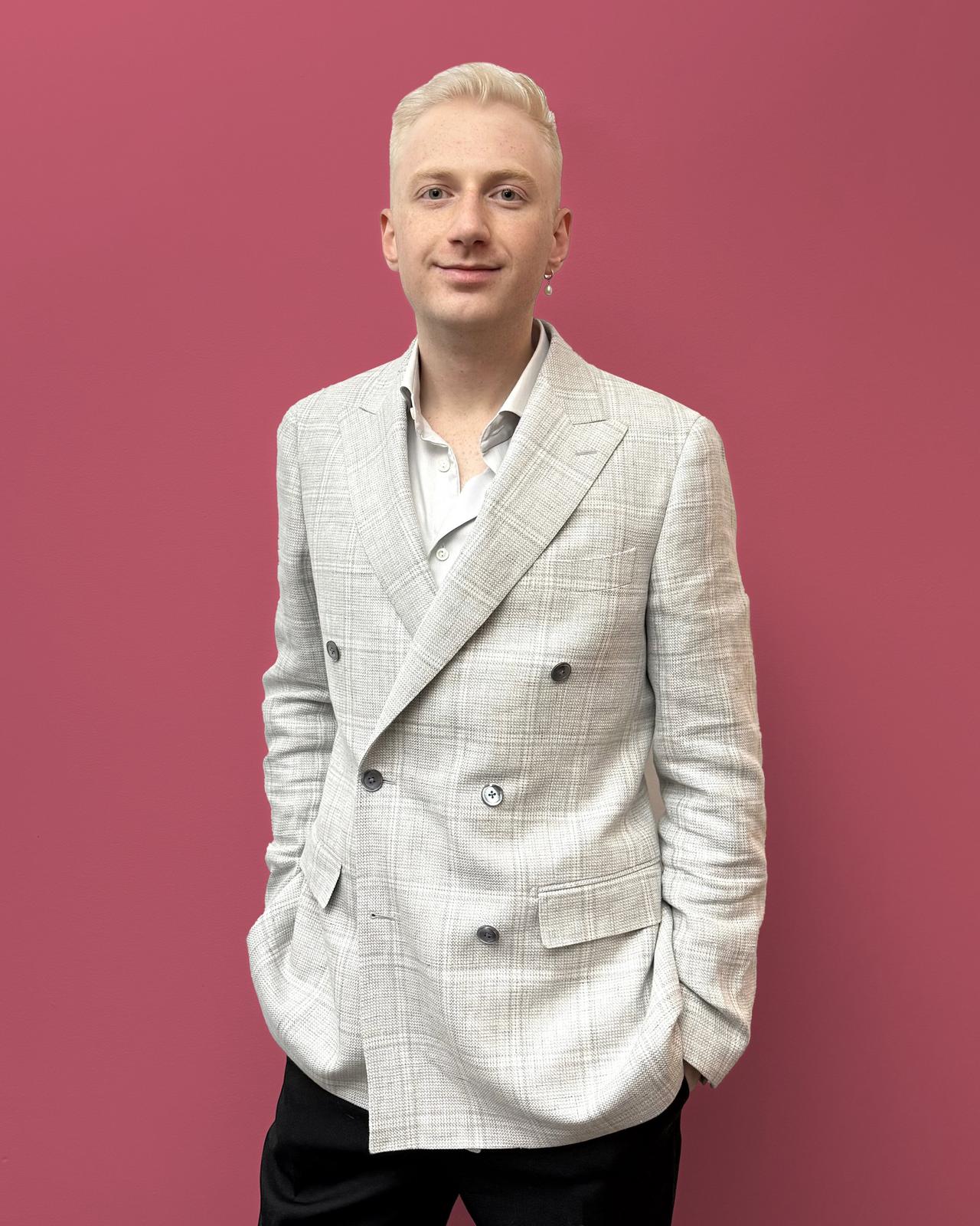 Daniil Teslenko on a coloured pink background