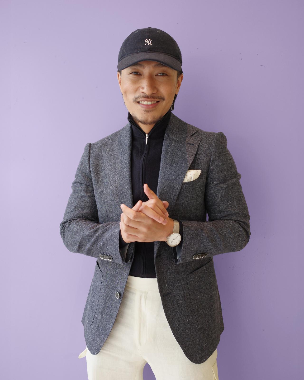 Zandrew Claveria on a coloured purple background