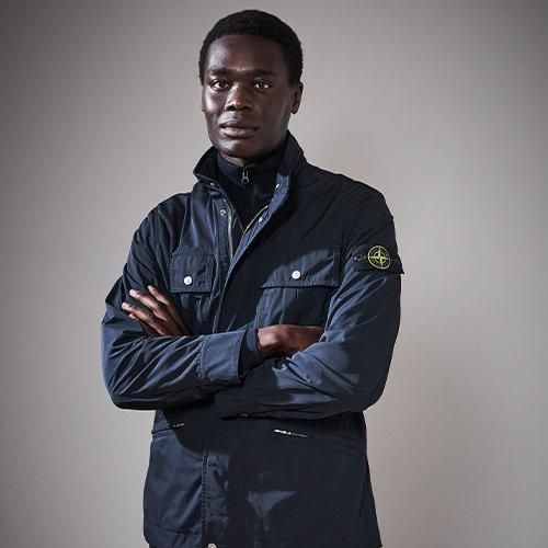 Male model wearing Stone Island