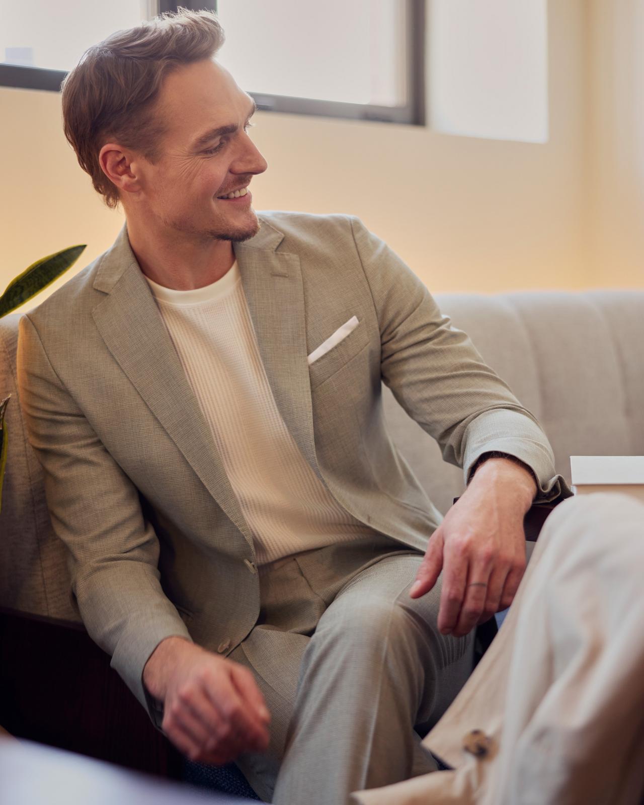 Male wearing suit signifying dressed to the nines for date night inspiration