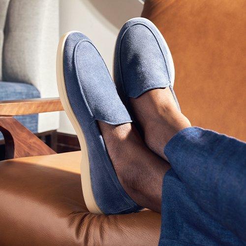Pair of blue Henderson white sole loafers