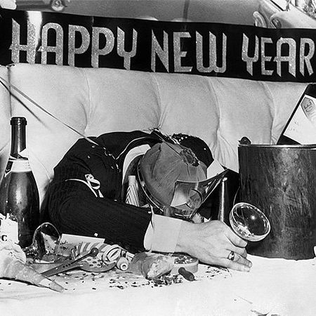 Black & White New Year's Eve: Man in Celebration Slump.