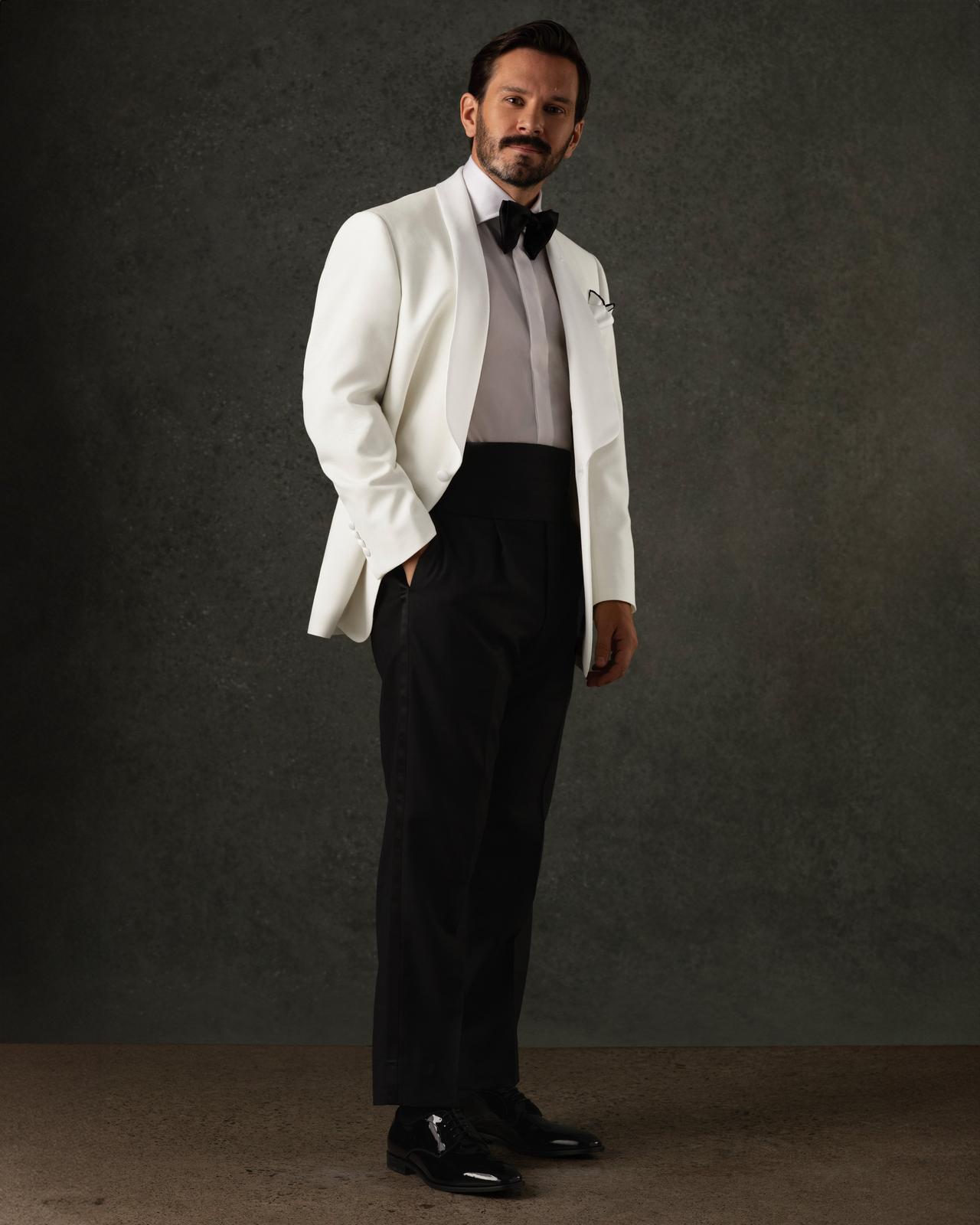 Man wearing a white Harold cocktail jacket